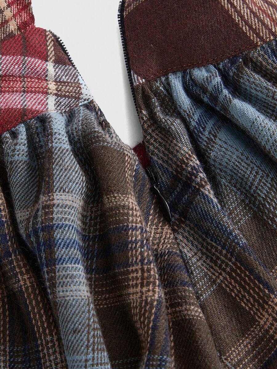 Women’s brown plaid halter mini dress with tie-front knot detail, backless design, sleeveless cut, slim A-line fit, and asymmetrical hem.