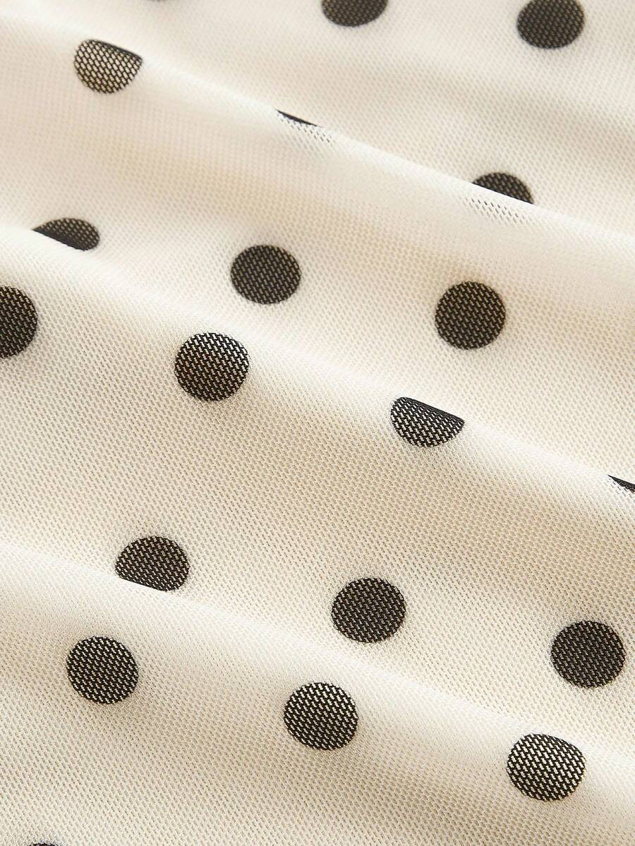 Women's polka dot mesh T-shirt with long flare sleeves, square neckline, bow detail, and asymmetric ruffle hem.