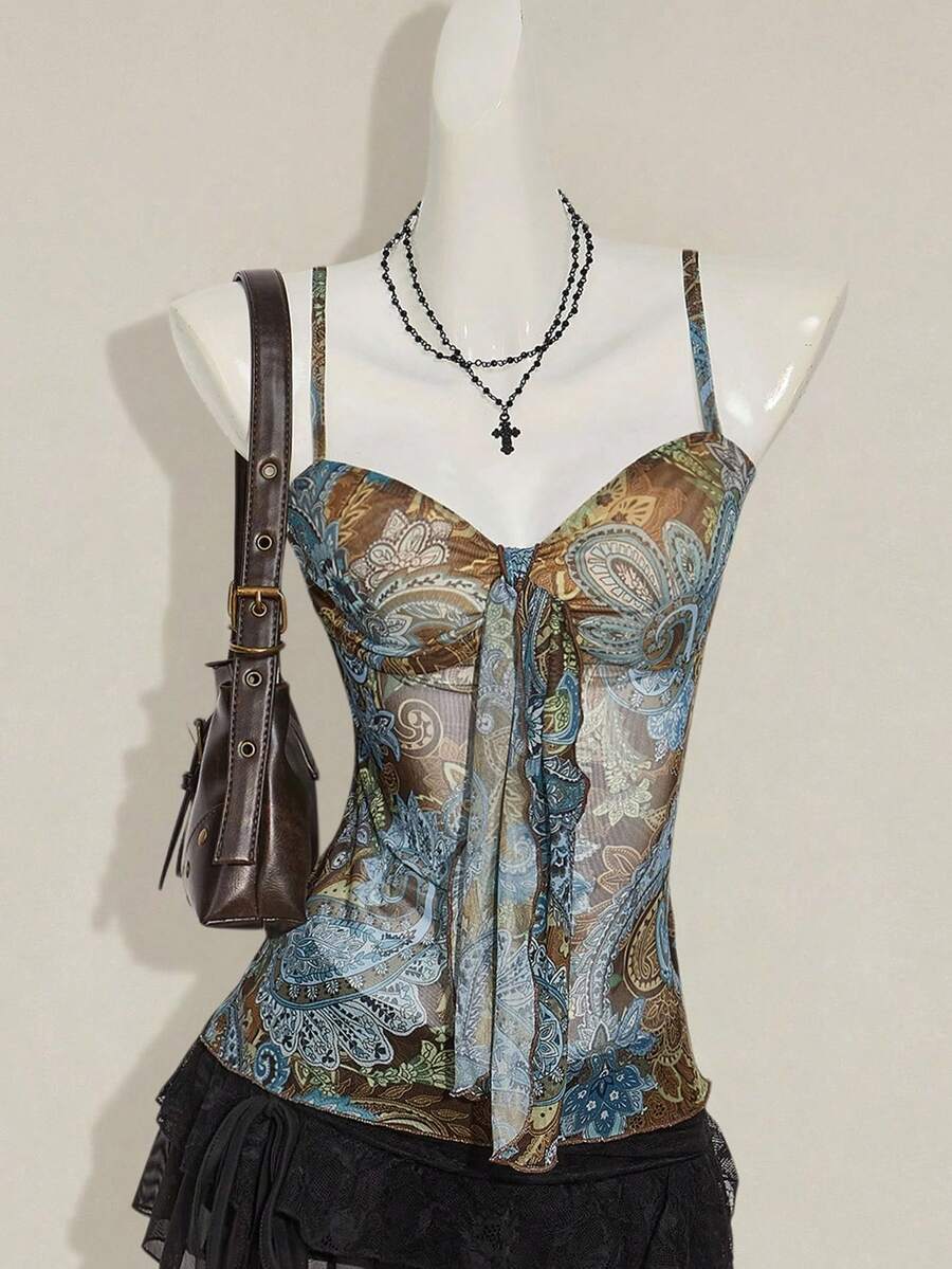 Women's green paisley print Y2K cami top with spaghetti straps, pleated styling, lace-up knot detail, and asymmetrical boho design.