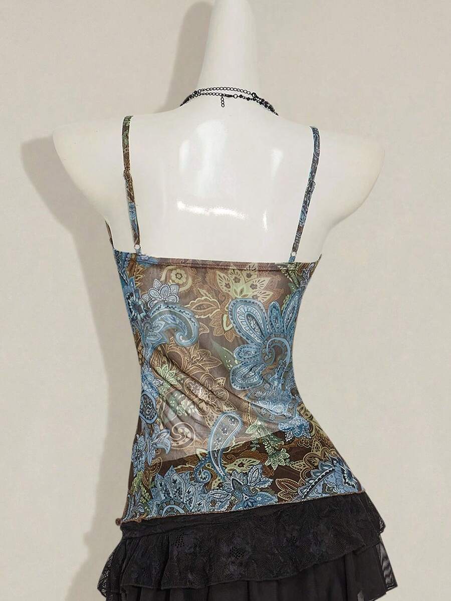 Women's green paisley print Y2K cami top with spaghetti straps, pleated styling, lace-up knot detail, and asymmetrical boho design.