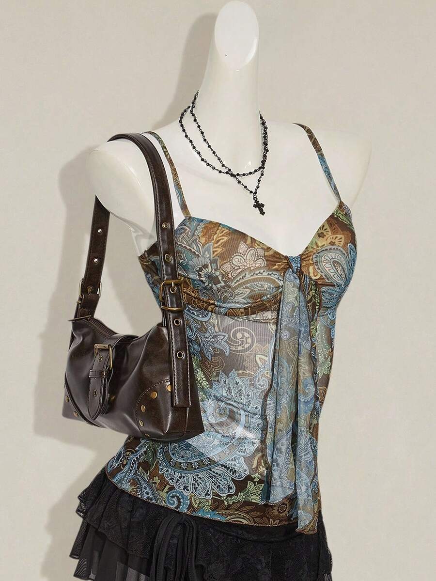 Women's green paisley print Y2K cami top with spaghetti straps, pleated styling, lace-up knot detail, and asymmetrical boho design.