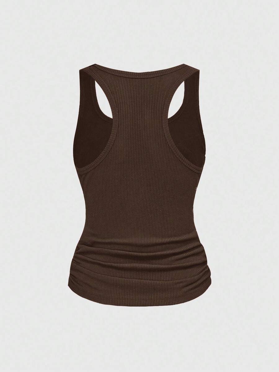 Women's slim fit black tank top featuring a square neckline, ruched styling, and cut out details.