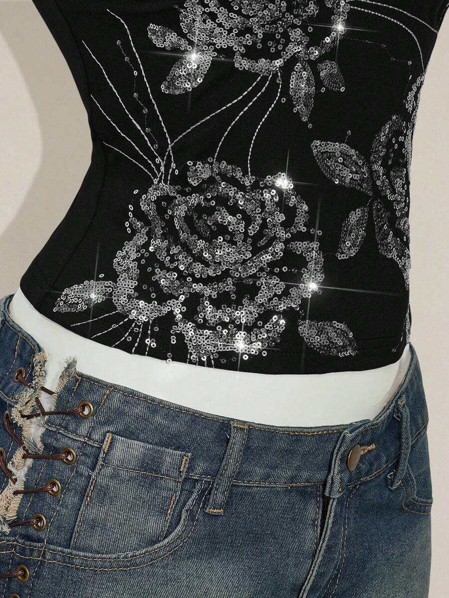 Women's floral embroidered sequin camisole top with thin spaghetti straps and a slim fit design.