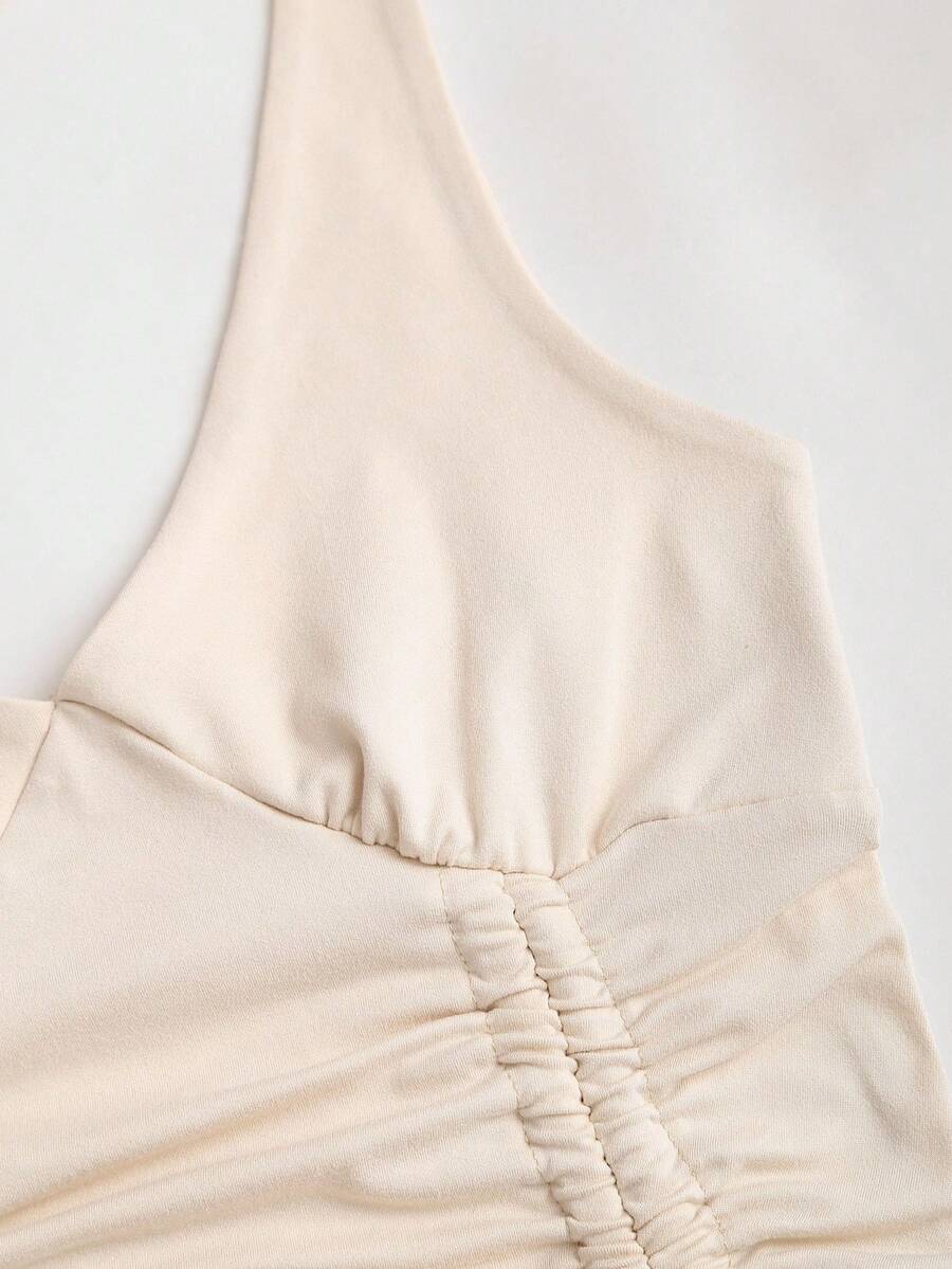 Women's sleeveless halter short dress with a backless design, ruched drawstring detail, slim fit, and asymmetrical hem.