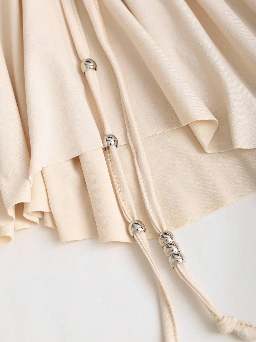 Women's sleeveless halter short dress with a backless design, ruched drawstring detail, slim fit, and asymmetrical hem.