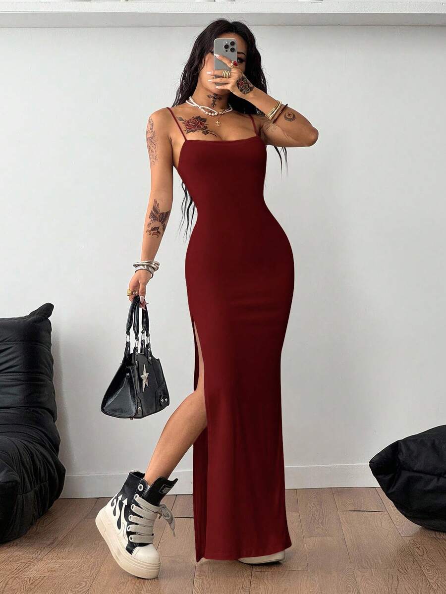 Women's backless cami midi dress in dark grey knit fabric featuring spaghetti straps, lace-up back design, and a split thigh slit.