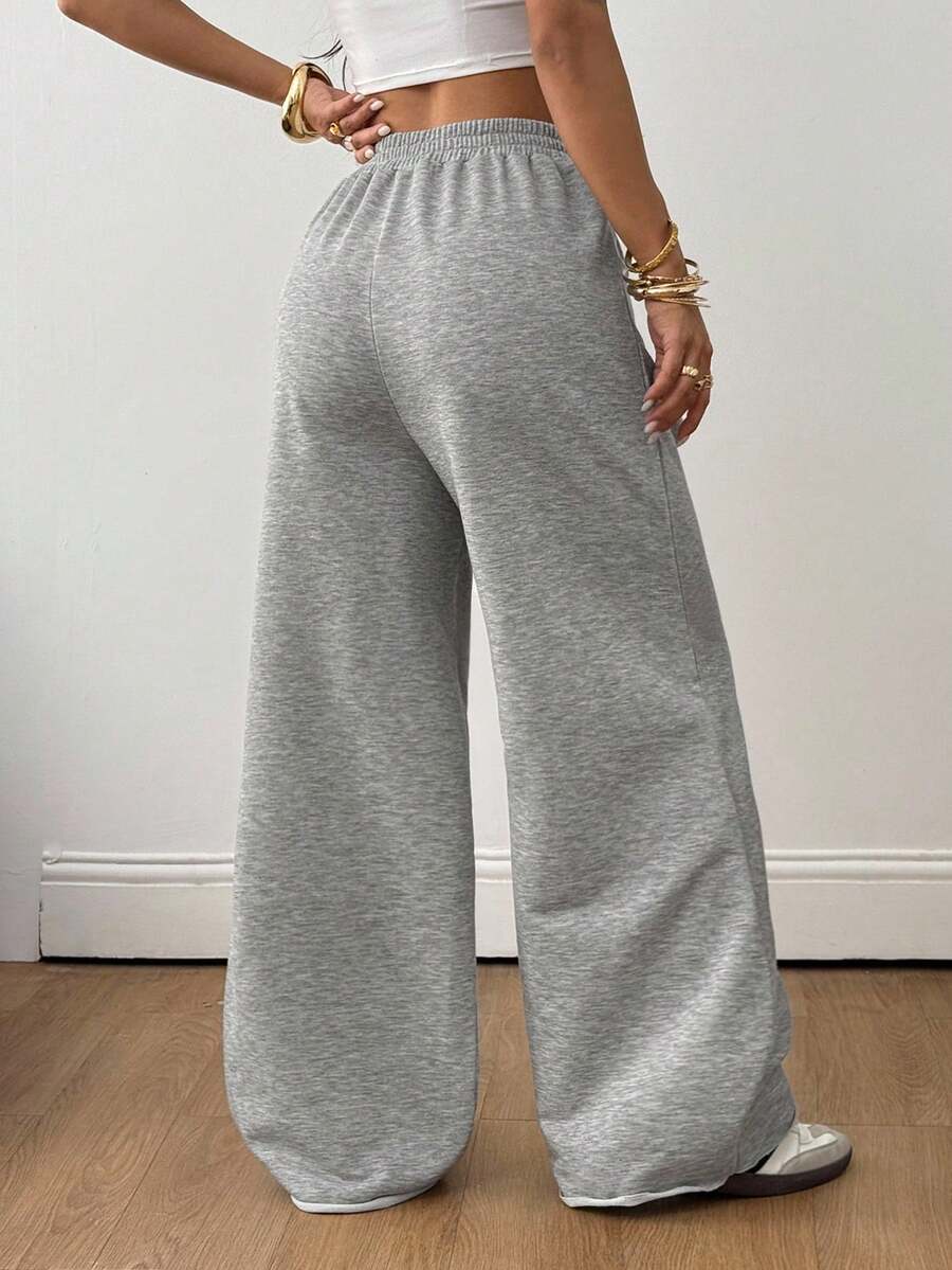 Women's loose straight leg casual pants with drawstring elastic waist and pockets