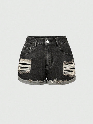 Front view of women's ripped denim shorts featuring raw hem, zipper fly, and pockets