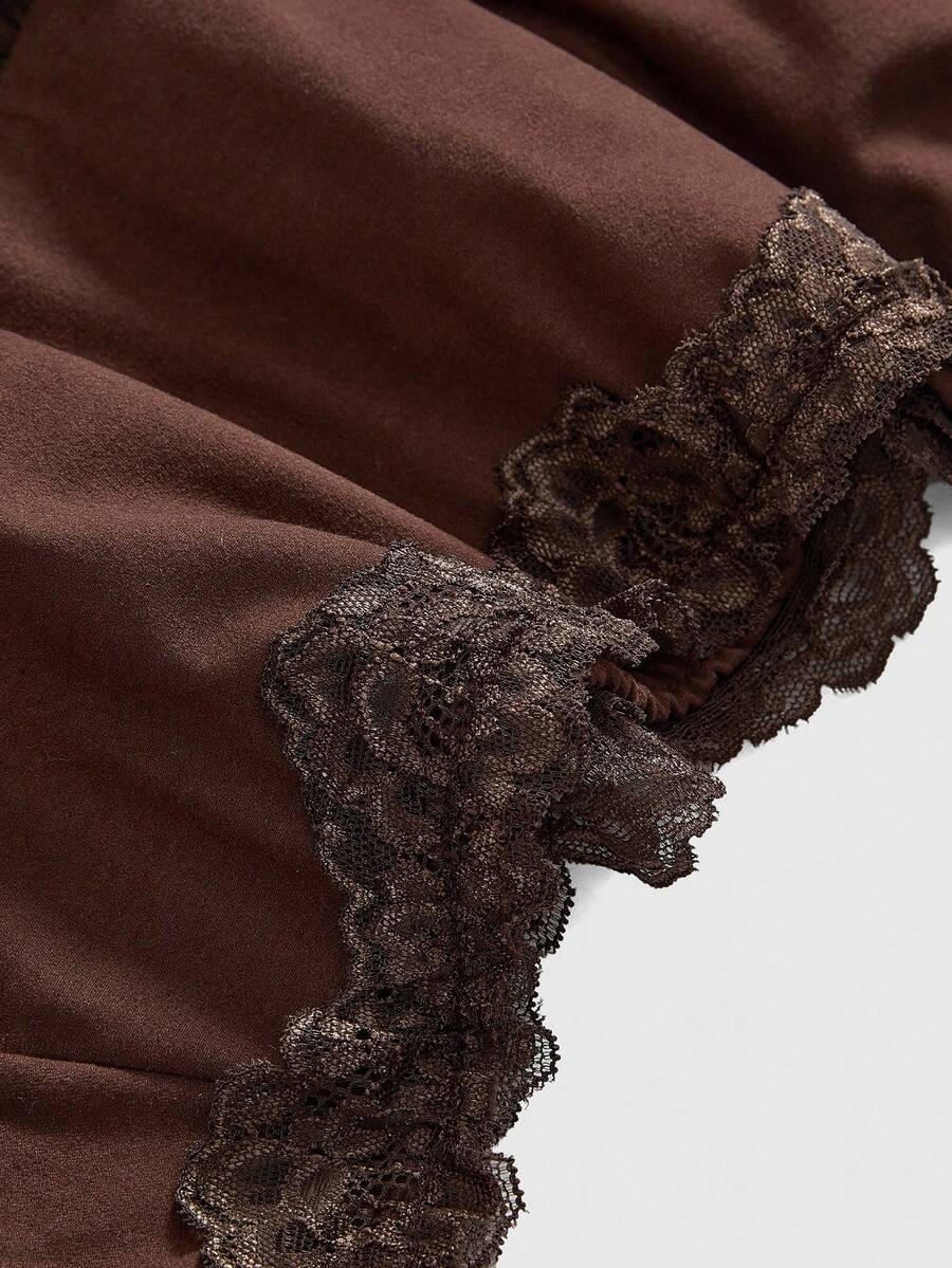 Women's low-waist leopard print mini skirt with drawstring tie-up, ruched detail, layered ruffle hem, and asymmetric grunge punk styling