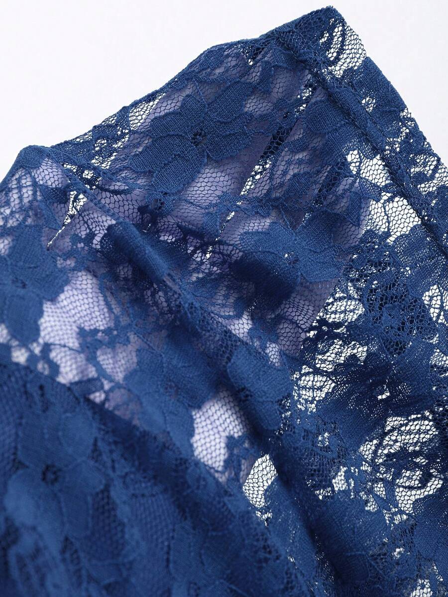 Women's solid lace halter top featuring a backless slim fit design with semi-sheer lace detail.