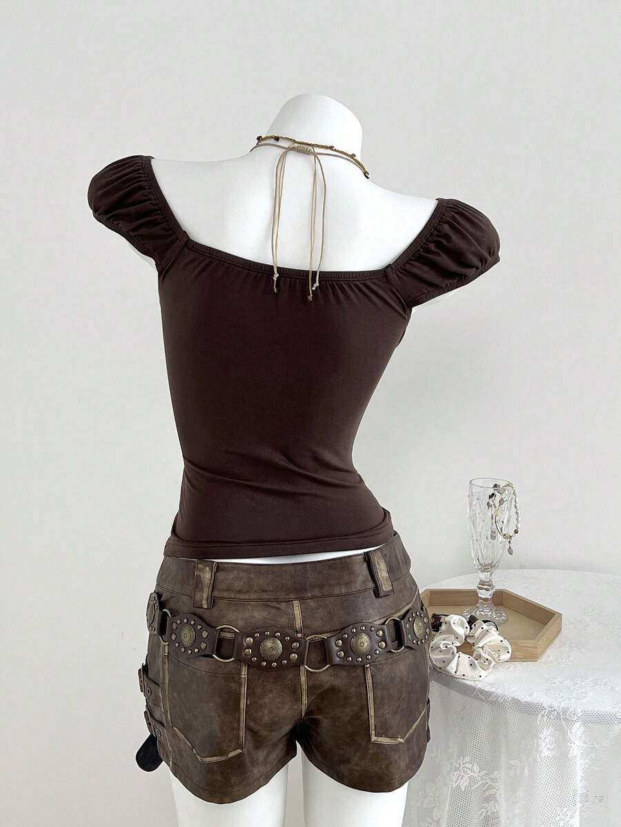 Women's brown slim-fit t-shirt with contrast lace trim, knot detail, scoop neck, and raglan cap sleeves.