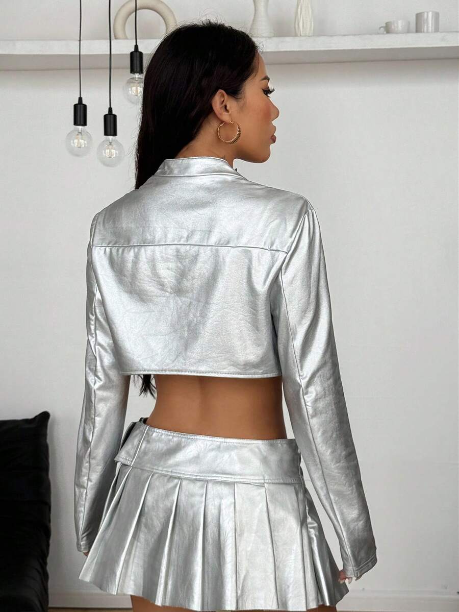 Women's khaki cropped military jacket featuring decorative Napoleon trim, long regular sleeves, tie neck, grommet eyelets, and single-breasted front closure.