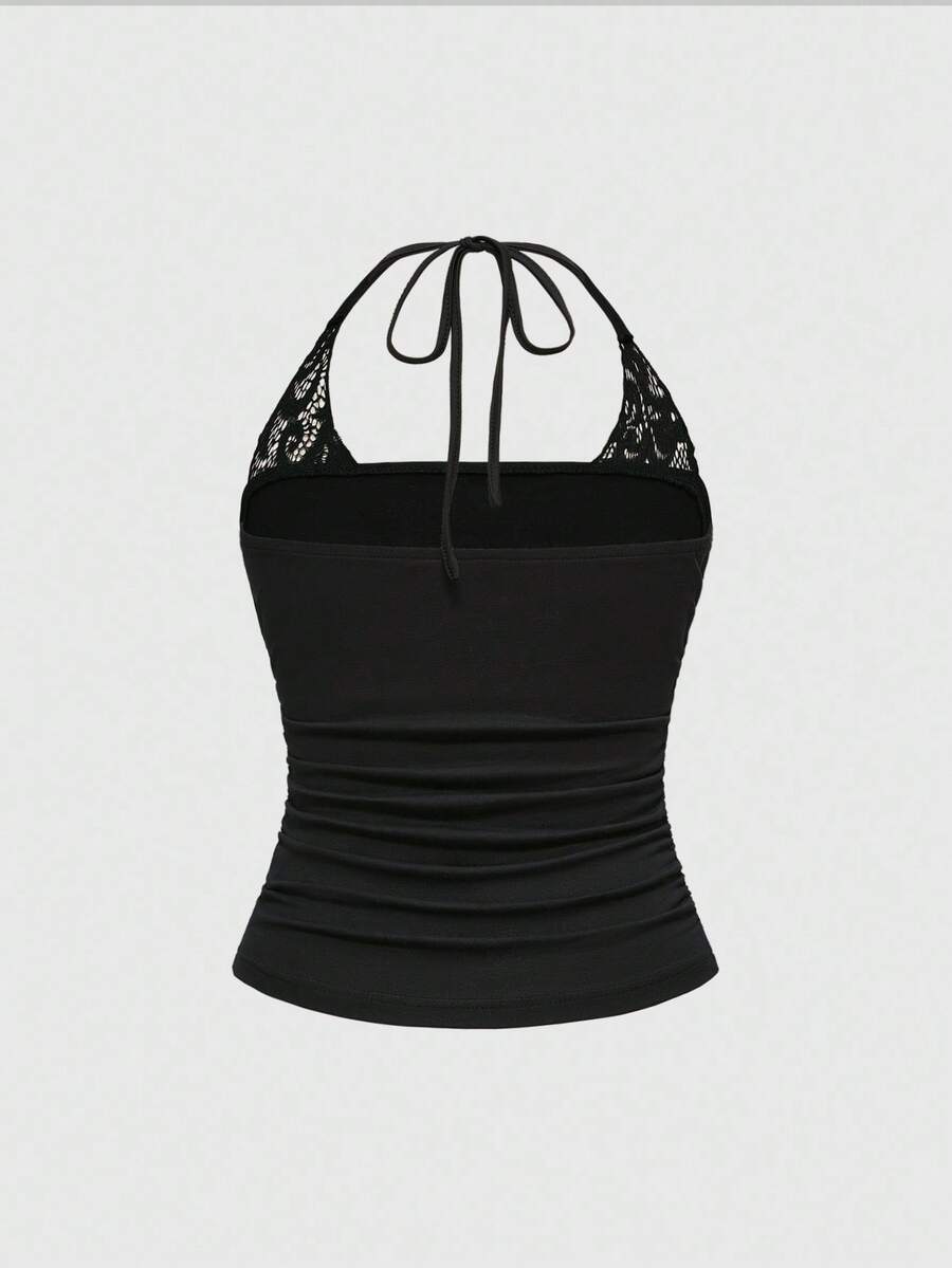 Women's cropped Y2K punk print halter cami top with contrast lace, backless knot detail, and slim fit knitted fabric
