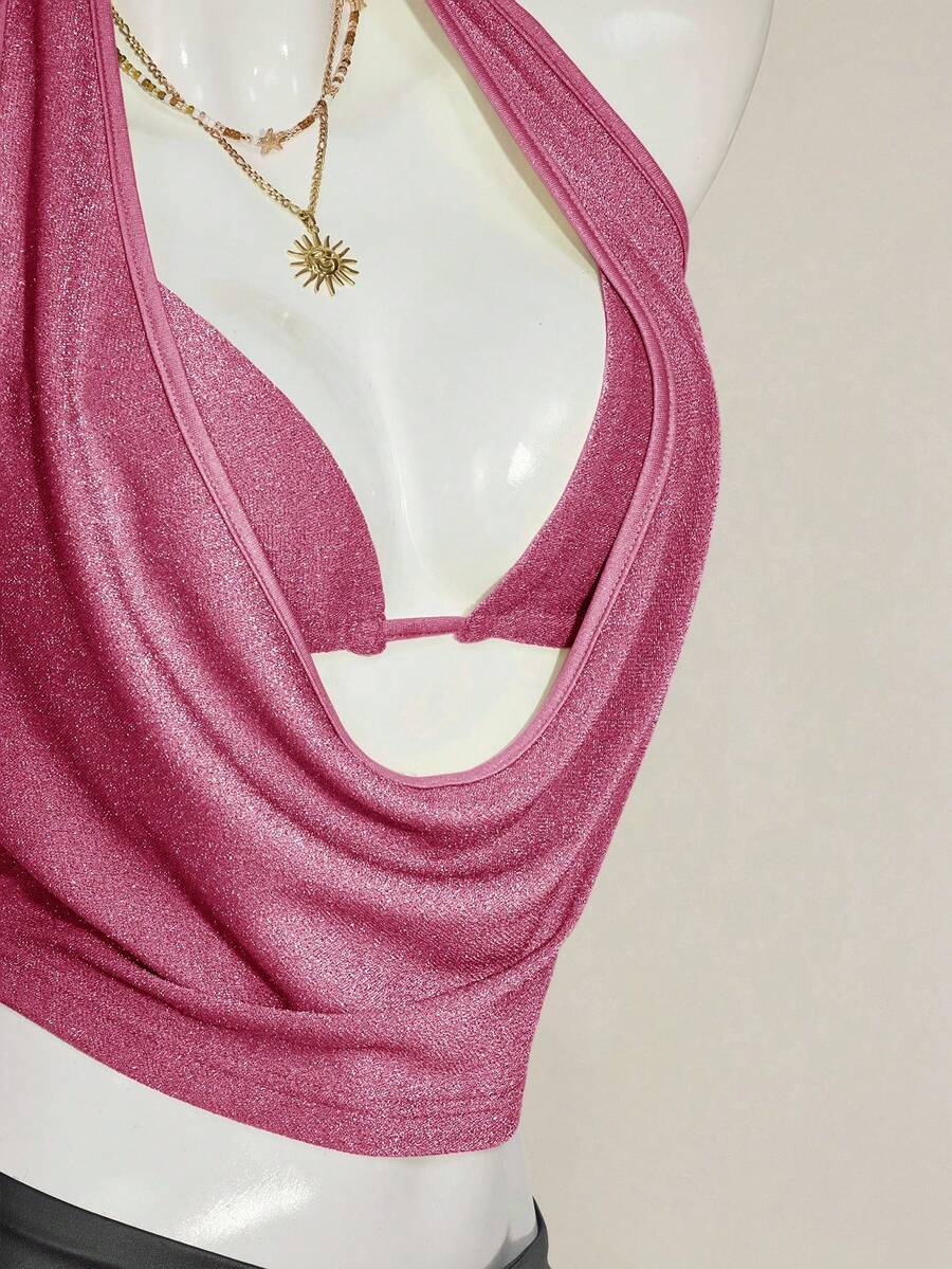Women's glitter halter backless micro crop tank top featuring a draped knot front design.