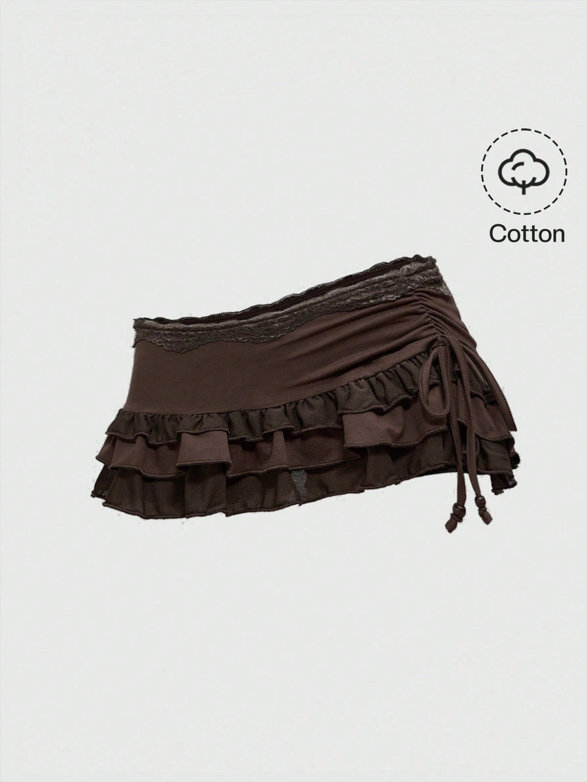 Women's black low-waist mini skirt with drawstring tie, ruched details, lace trim, layered ruffle hem, and asymmetric styling