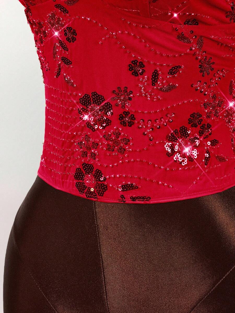 Women's embroidered sequin halter cami top featuring a deep V-neck, backless party design, and slim fit silhouette.