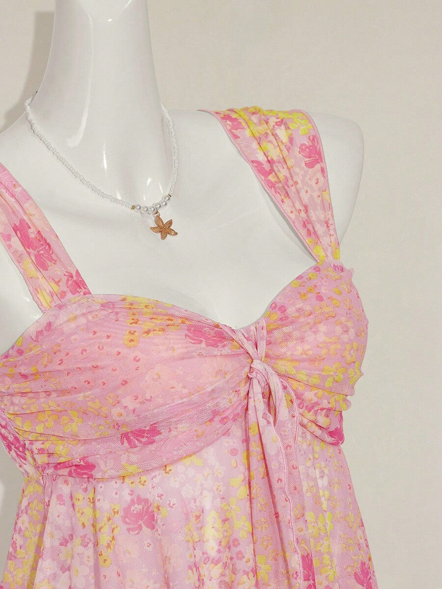 Women's white cherry print cami top with wide straps, ruched knot detail, and an asymmetrical hem