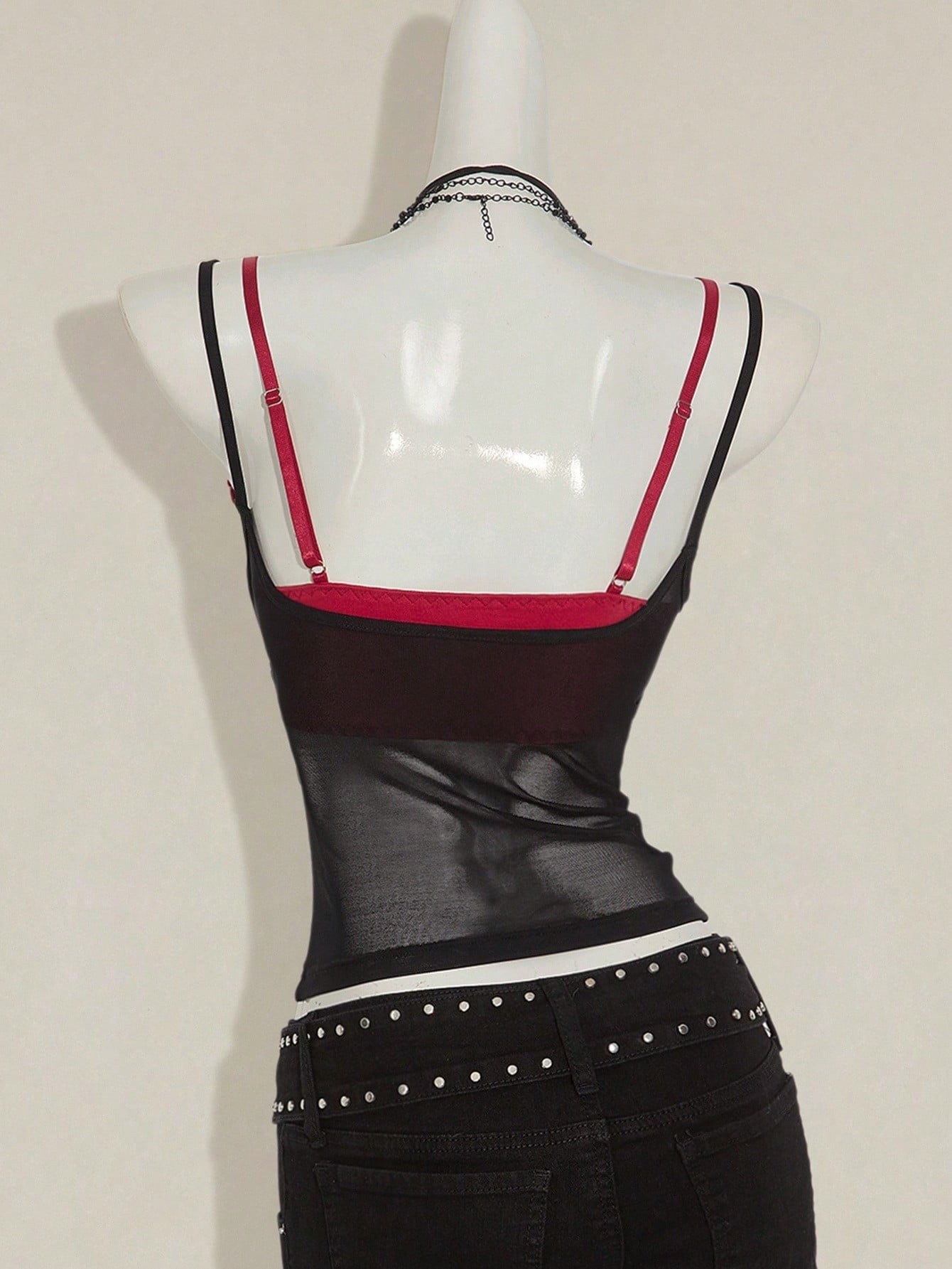 Women's two-piece semi-sheer mesh camisole and lace spaghetti strap crop top set with contrast lace, backless asymmetrical design, and slim fit
