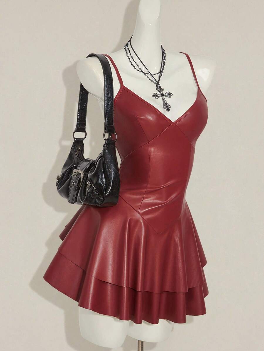 Women's Y2K PU leather mini dress with spaghetti straps, V-neckline, backless design, zipper closure, high waist, slim A-line fit, and layered tiered hem.
