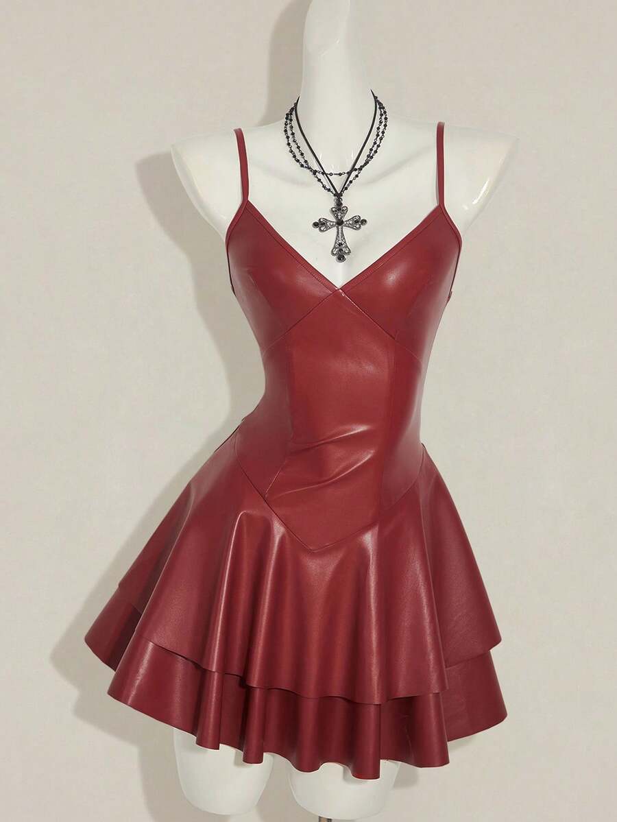 Women's Y2K PU leather mini dress with spaghetti straps, V-neckline, backless design, zipper closure, high waist, slim A-line fit, and layered tiered hem.