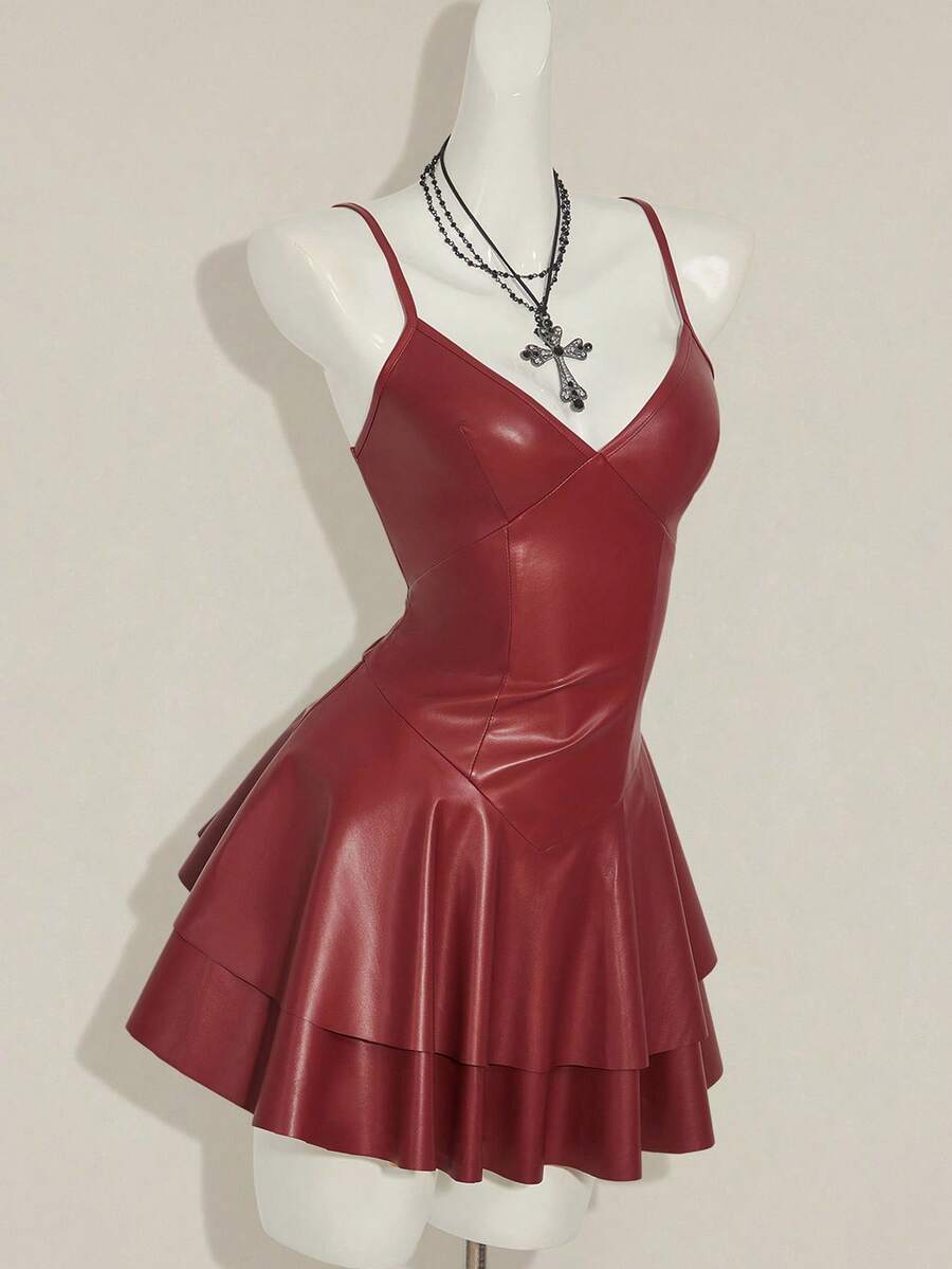 Women's Y2K PU leather mini dress with spaghetti straps, V-neckline, backless design, zipper closure, high waist, slim A-line fit, and layered tiered hem.