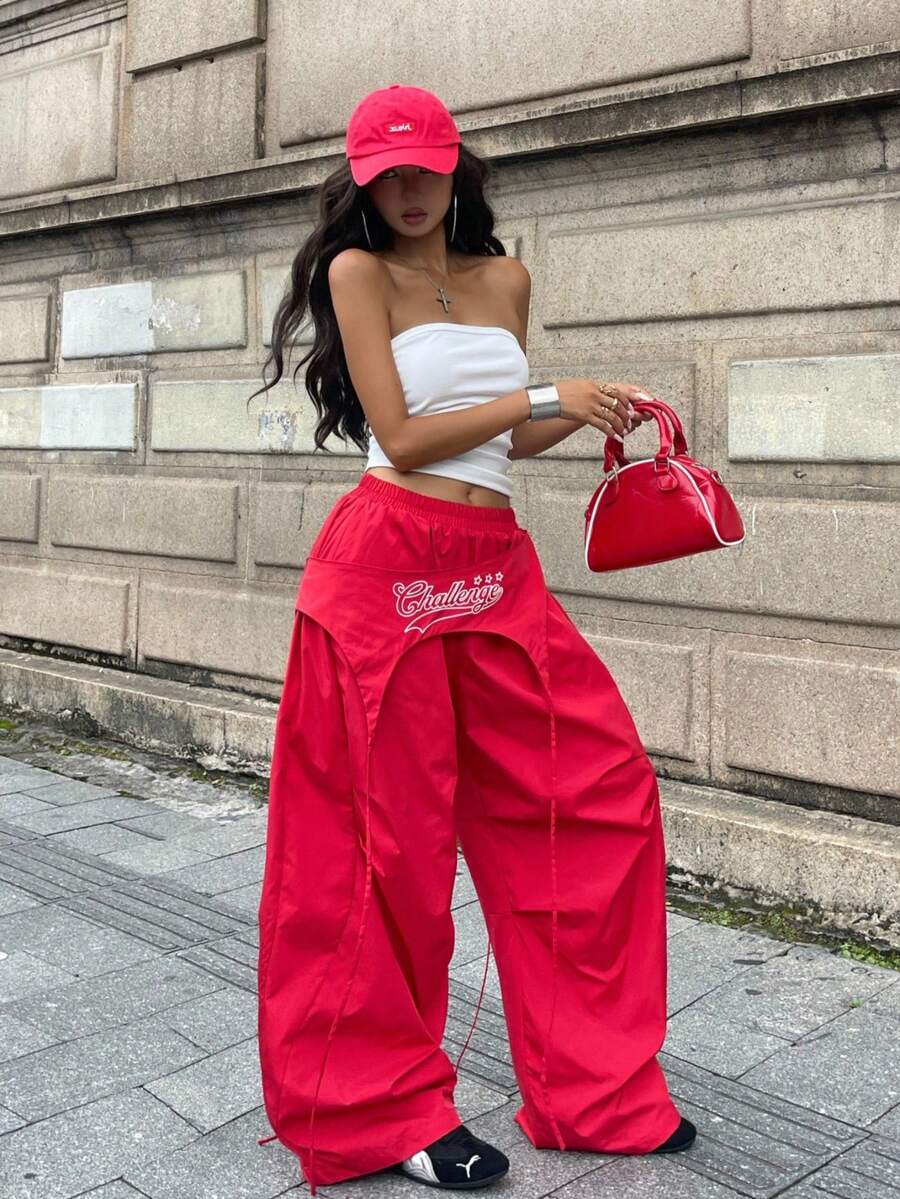 Women's casual wide leg long pants featuring an elastic drawstring waistband and loose fit silhouette.