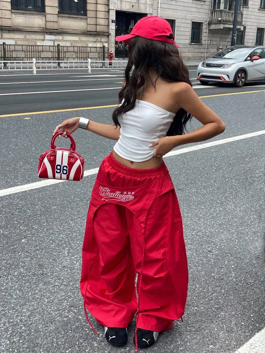 Women's casual wide leg long pants featuring an elastic drawstring waistband and loose fit silhouette.