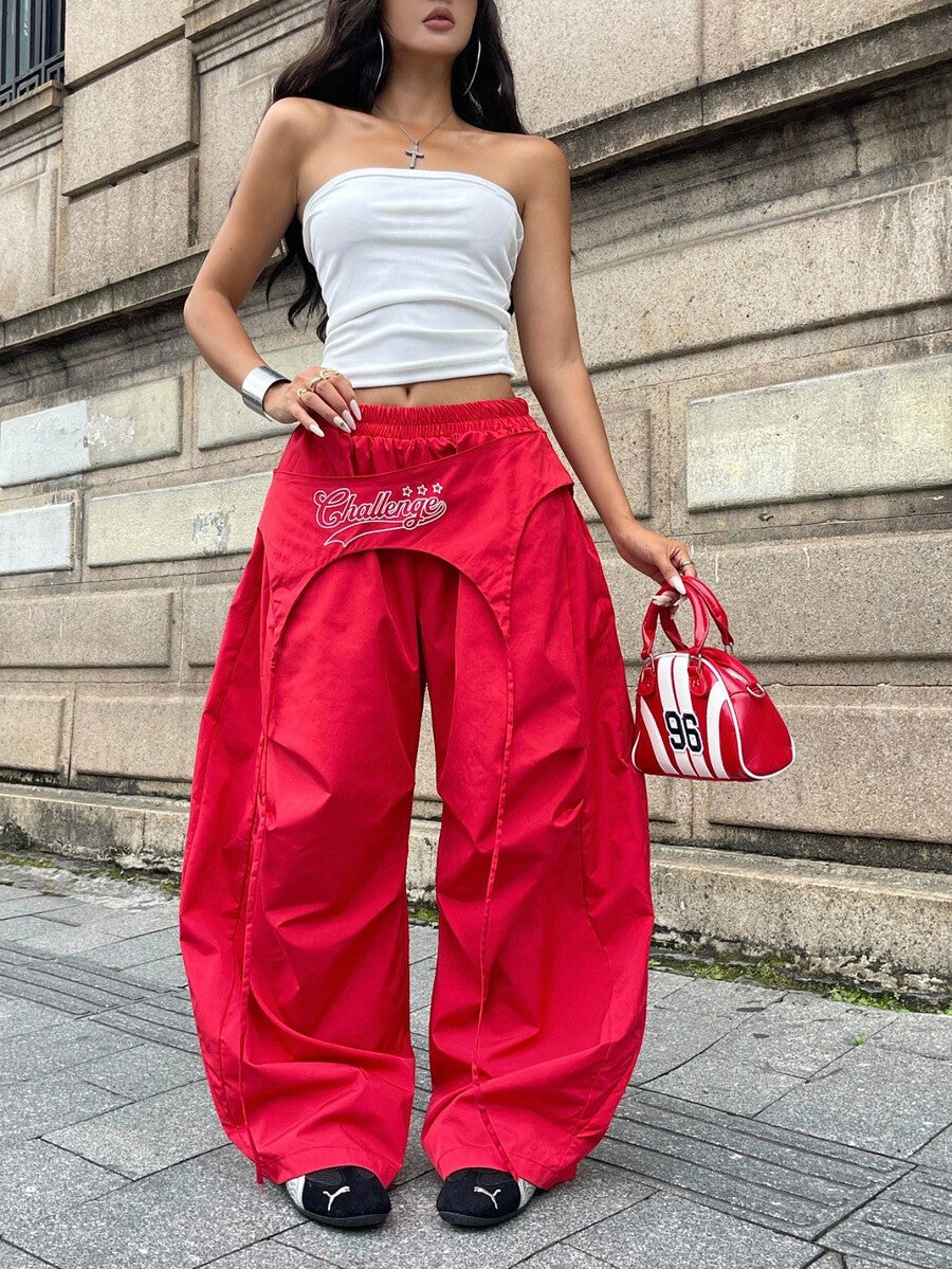Women's casual wide leg long pants featuring an elastic drawstring waistband and loose fit silhouette.