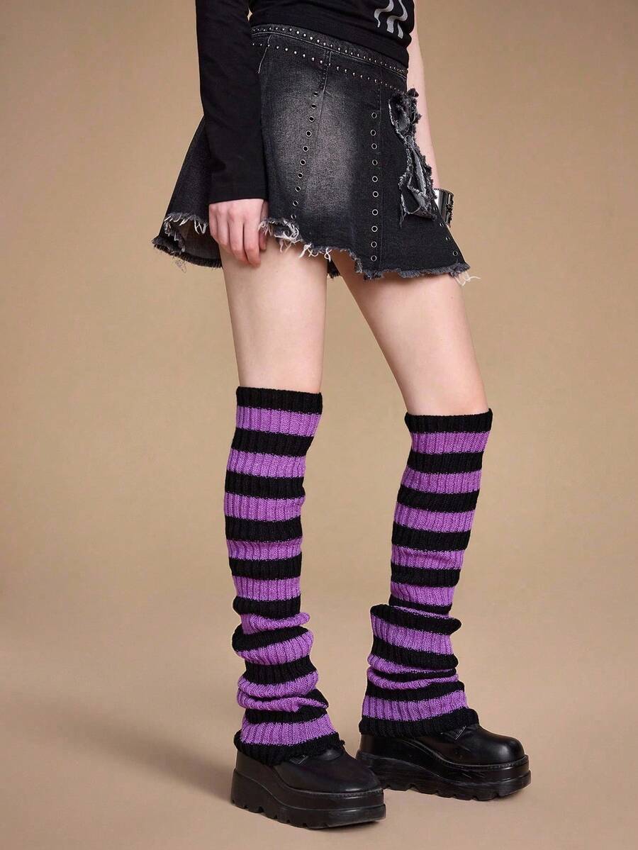 Pair of women's extra long knitted leg warmers featuring a gothic grunge design with subtle ruffle detailing.