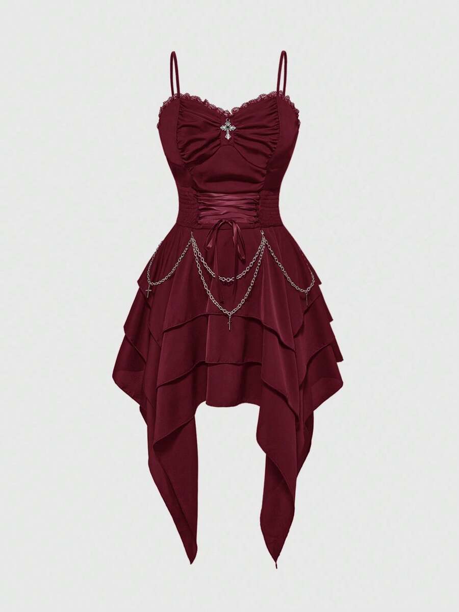 Women's vintage gothic cami dress with high-waist lace-up detail, spaghetti straps, zipper closure, and an asymmetrical knee-length hem.