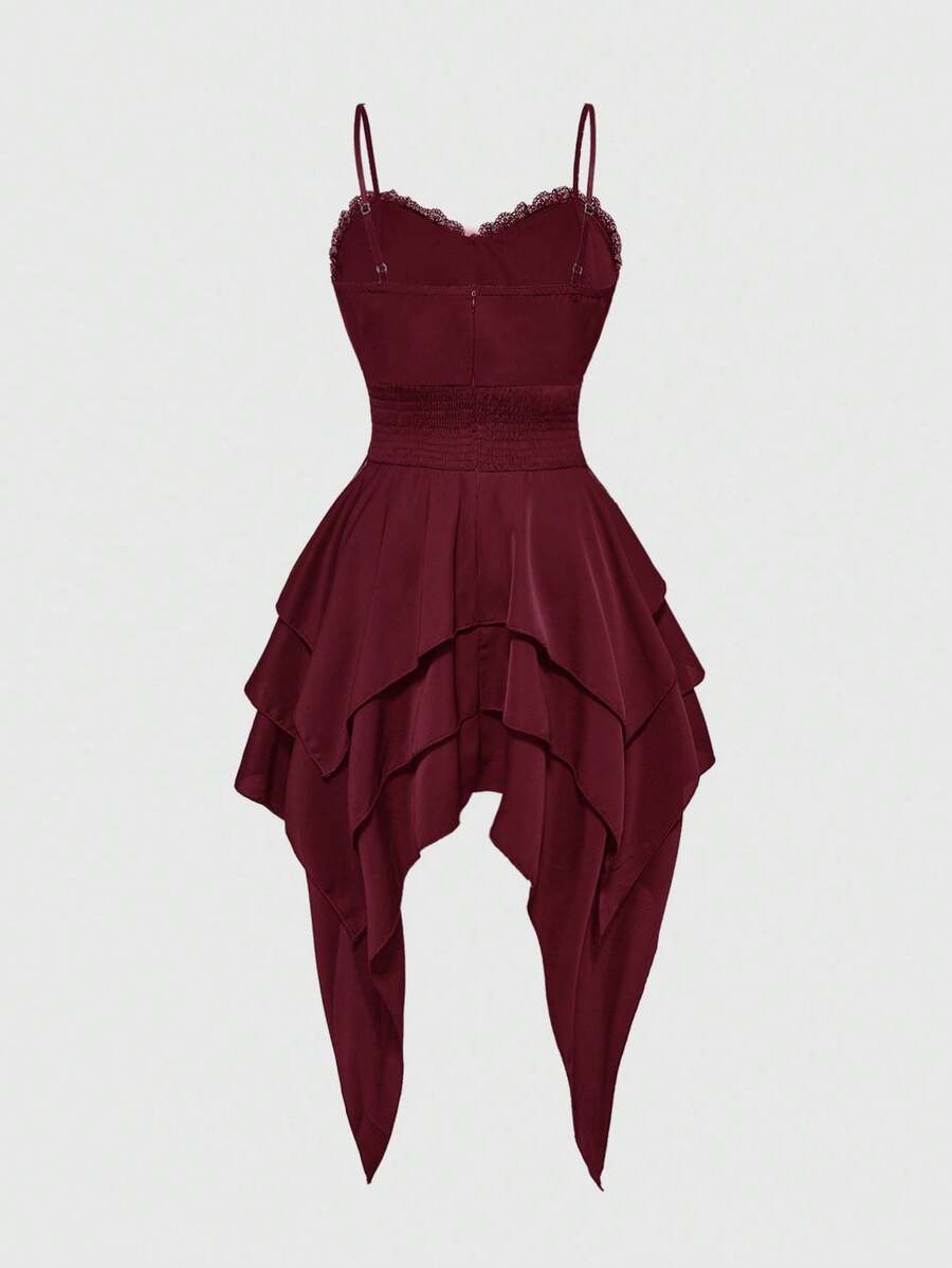Women's vintage gothic cami dress with high-waist lace-up detail, spaghetti straps, zipper closure, and an asymmetrical knee-length hem.