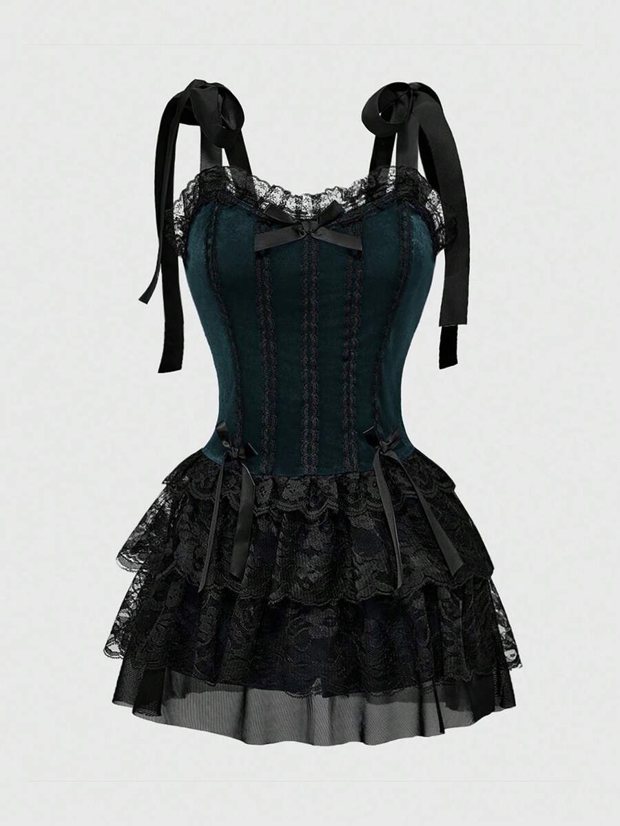 Gothic velvet halter mini dress with contrast lace trim, bow detail, lace-up accents, arm sleeves, layered hem, and cross pendant.