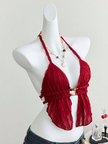 Women's textured halter camisole with pearl bead details, backless styling, asymmetrical hem, and micro crop slim fit