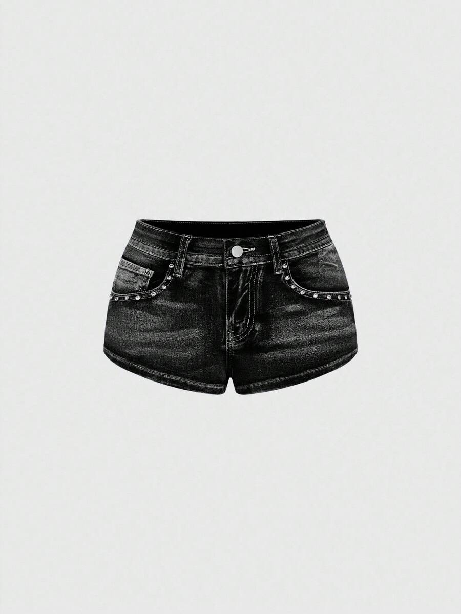 Women's ultra low waist skort with mini shorts length, zipper fly, pockets, pistol embroidery, and rhinestone details