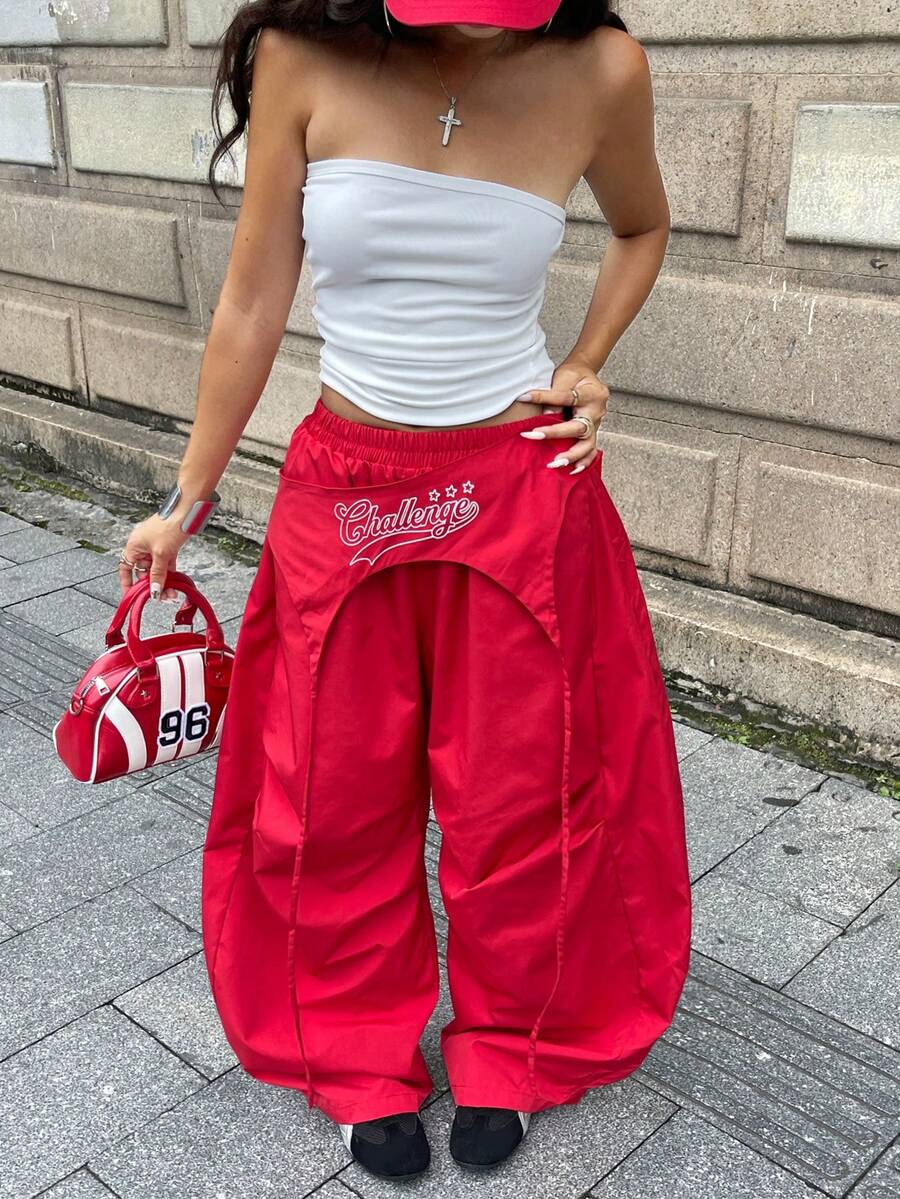 Women's casual wide leg long pants featuring an elastic drawstring waistband and loose fit silhouette.
