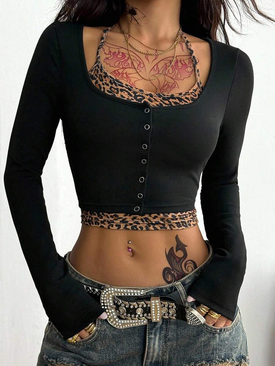 Women's cropped long sleeve 2-in-1 graphic T-shirt with scoop neck, tree branch pattern, patchwork camisole look, and gold button detail