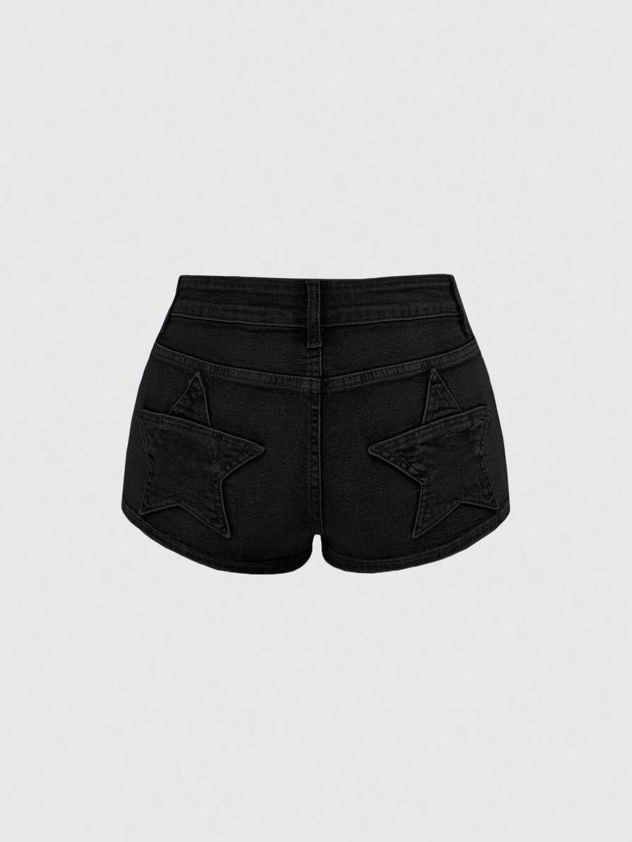 Women's ultra low waist mini shorts with back pockets, zipper fly, button detail, random print, and star patch in a grunge punk Y2K style.