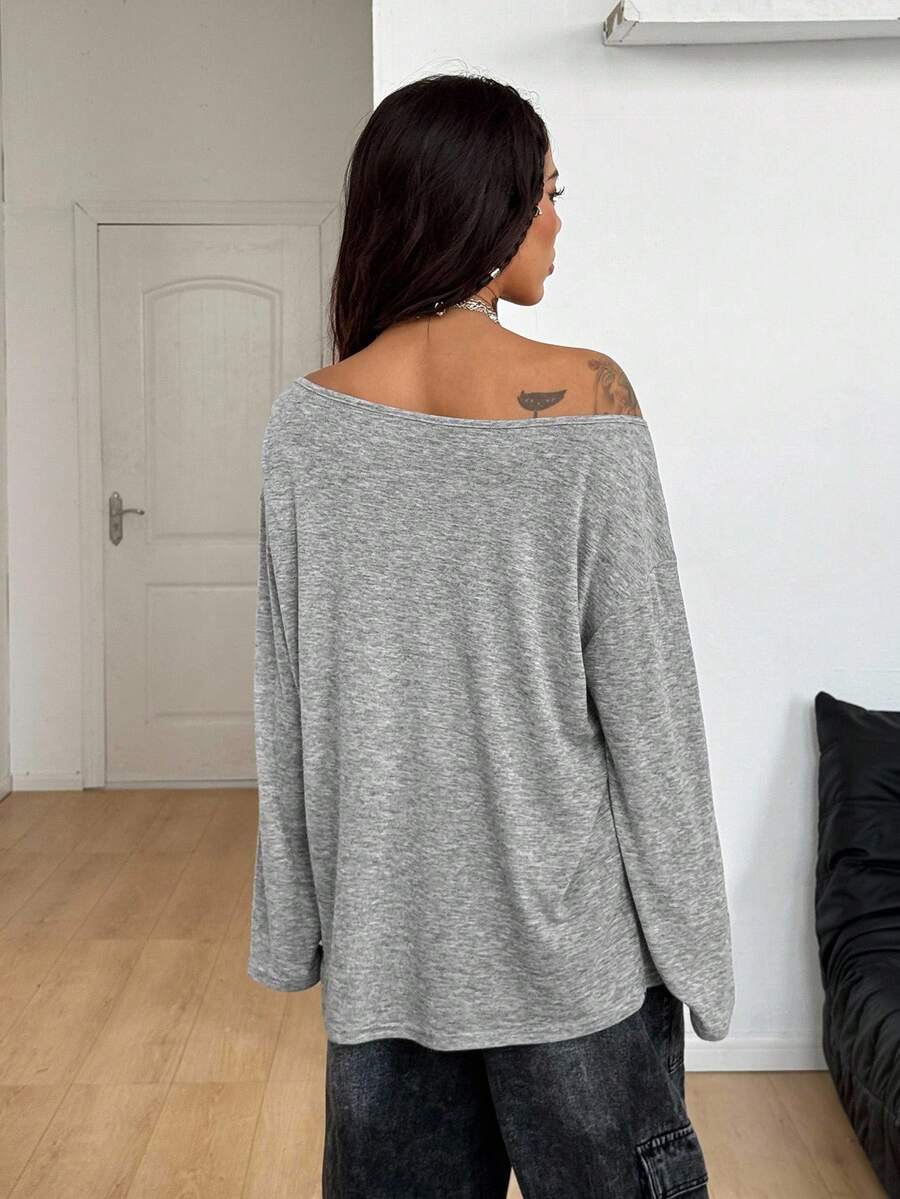 Women's brown striped boat neck long sleeve raglan T-shirt with a loose casual fit