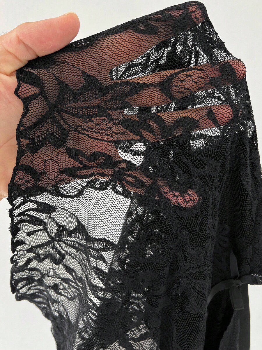 Women's polka dot sheer mesh crop blouse featuring contrast scallop lace trim along the V-neckline and long sleeves in a slim fit silhouette.