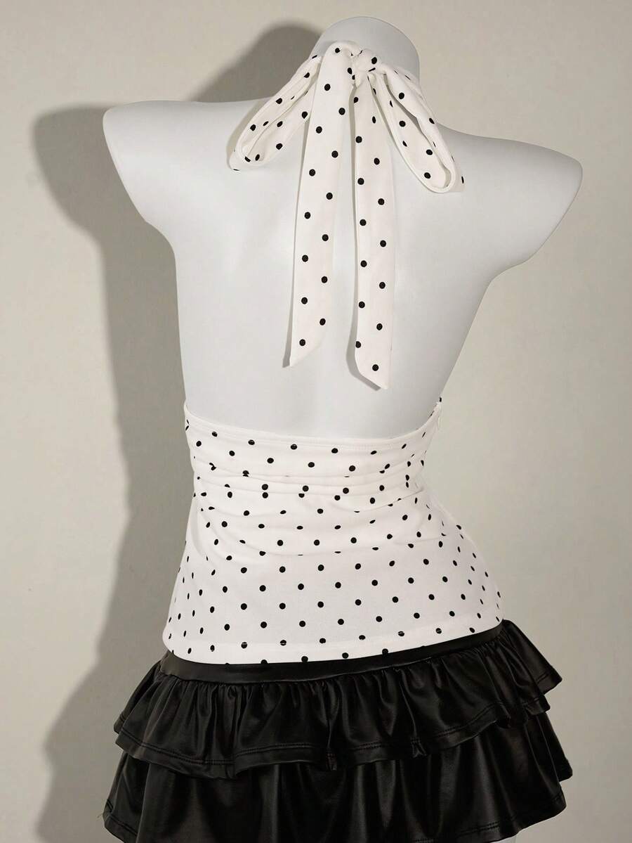 White women's deep V-neck halter tank top with ruched waist, backless design, rib-knit texture, and ruffle hem