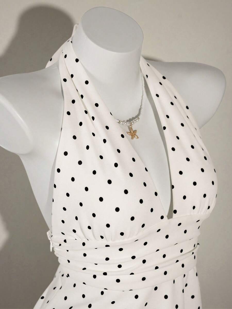 White women's deep V-neck halter tank top with ruched waist, backless design, rib-knit texture, and ruffle hem