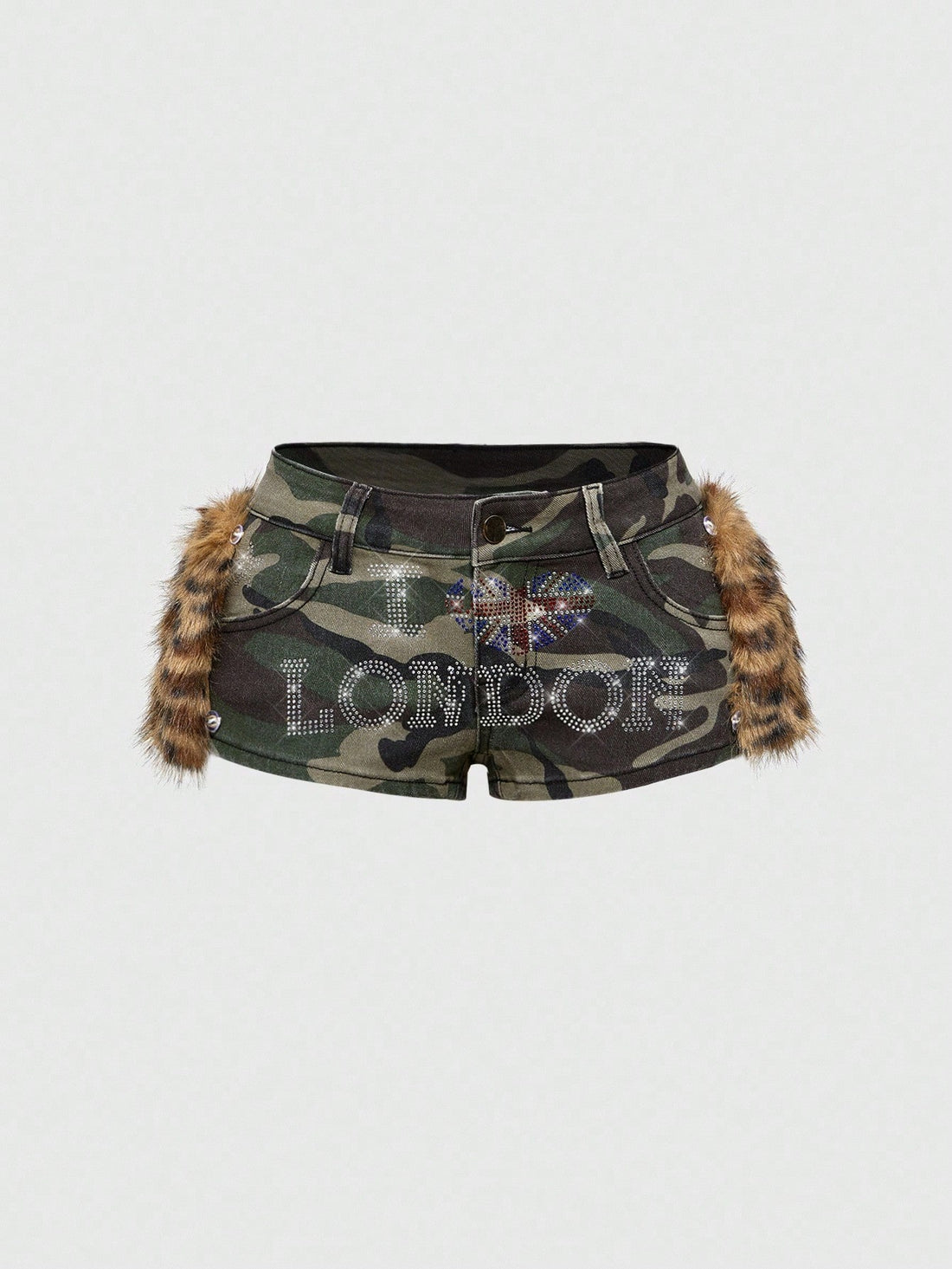 Army green Y2K K-pop style ultra low waist mini shorts with patchwork camo, star graphic details, rhinestone decoration, zipper fly, and pockets.