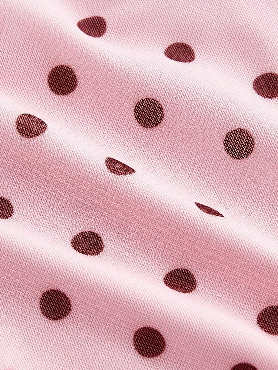Women's polka dot mesh T-shirt with long flare sleeves, square neckline, bow detail, and asymmetric ruffle hem.