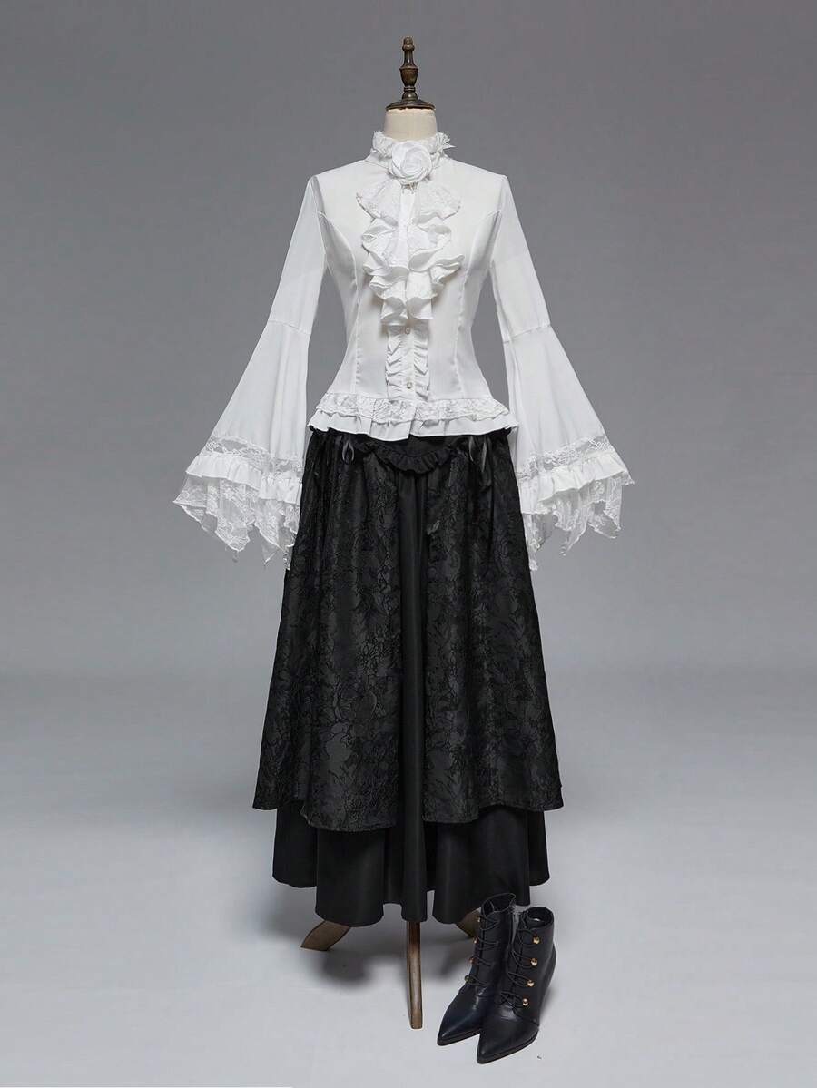 Women's gothic lace blouse with flare long sleeves, tie neckline, and semi-sheer embroidery details.