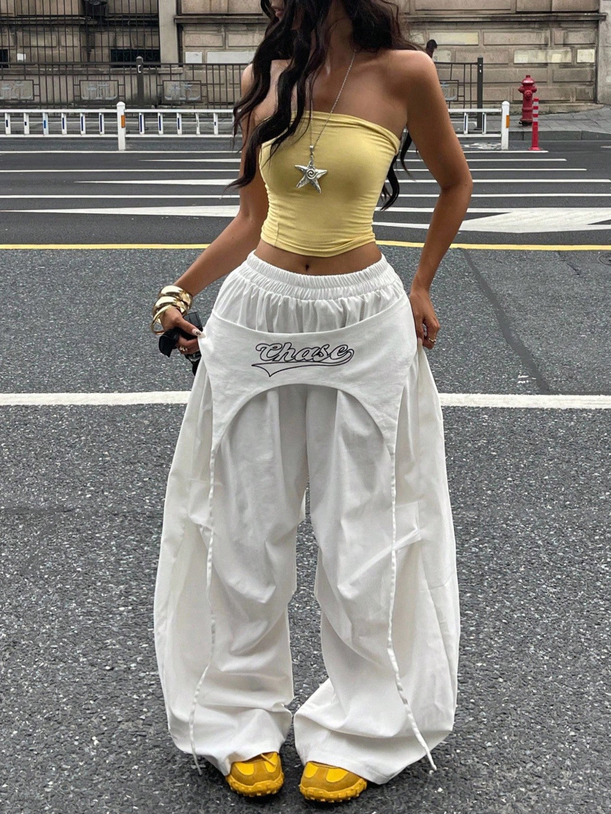 Women's loose fit wide leg parachute pants with elastic drawstring waist and side pockets