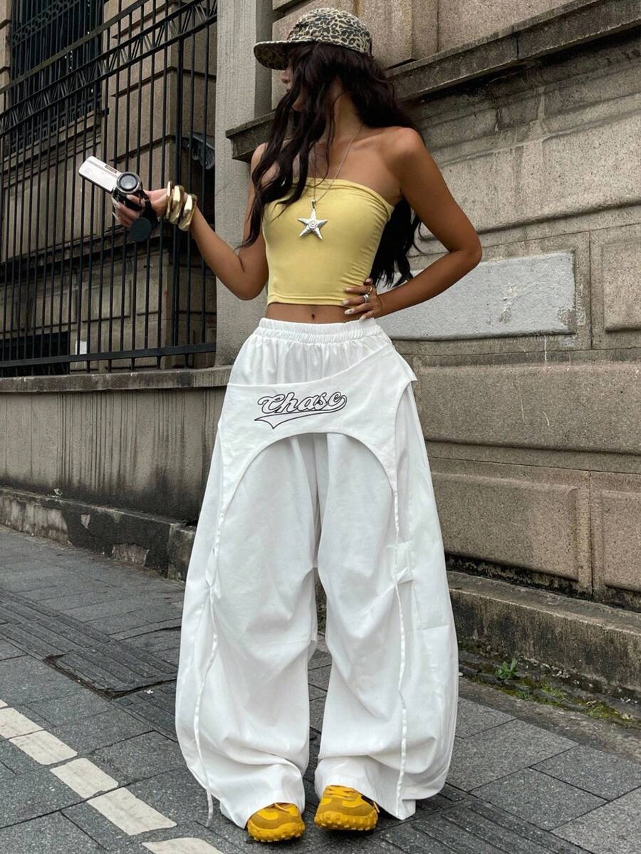 Women's loose fit wide leg parachute pants with elastic drawstring waist and side pockets