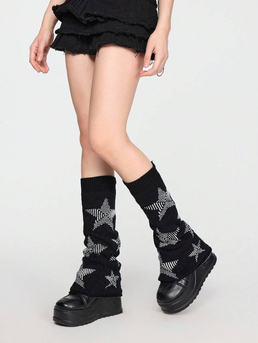 Pair of women's extra long knitted leg warmers featuring a gothic grunge design with subtle ruffle detailing.