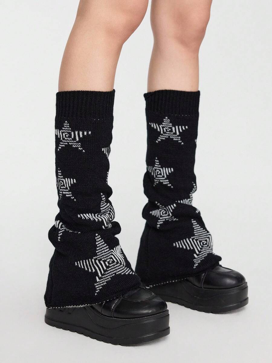 Pair of women's extra long knitted leg warmers featuring a gothic grunge design with subtle ruffle detailing.