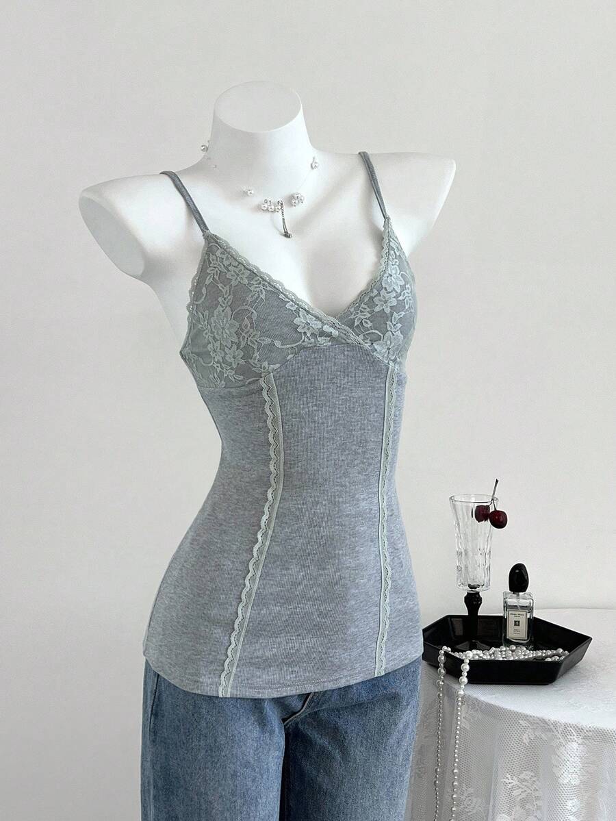 Women's slim fit backless cami tank top with contrast lace patchwork details, spaghetti straps, and high-stretch knitted ribbed fabric.