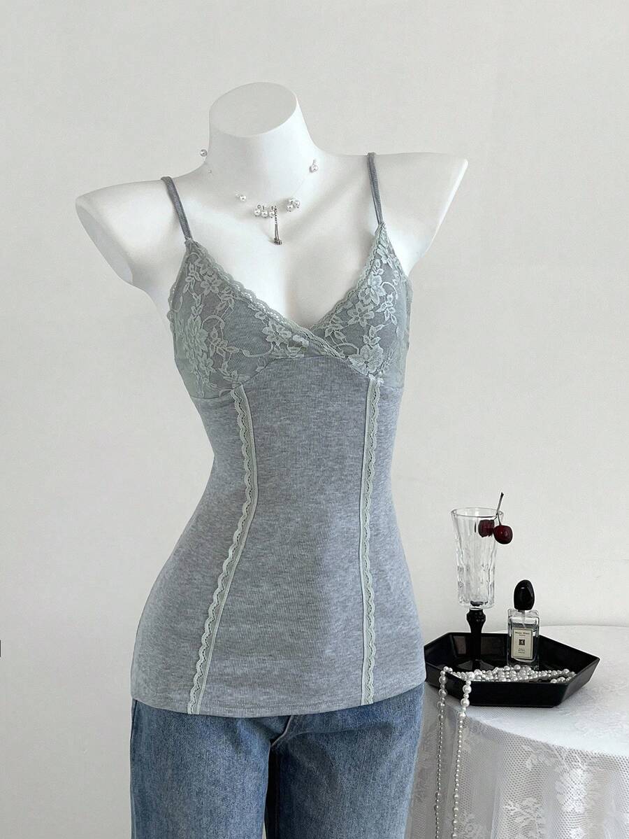 Women's slim fit backless cami tank top with contrast lace patchwork details, spaghetti straps, and high-stretch knitted ribbed fabric.